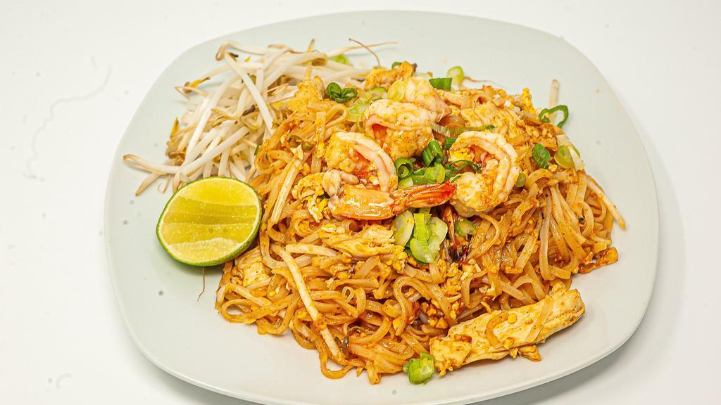 Pad Thai · Rice noodles sauteed with chicken and shrimp, mixed with peanuts, eggs and bean sprouts.