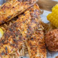 Blackened Catfish Dinner · Fresh catfish seasoned with our house blackened spices and seared on the grill. Served with ...