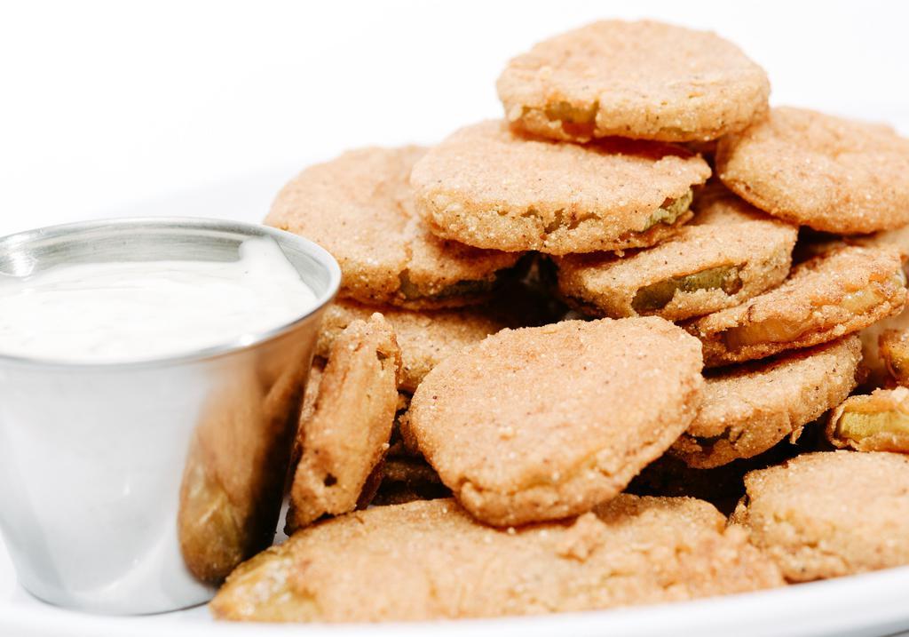 Fried Pickle Chips · Thinly sliced zesty pickle chips, served with ranch.