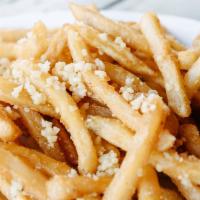 Garlic Fries · Our specialty garlic with a side of our house crispy fries.