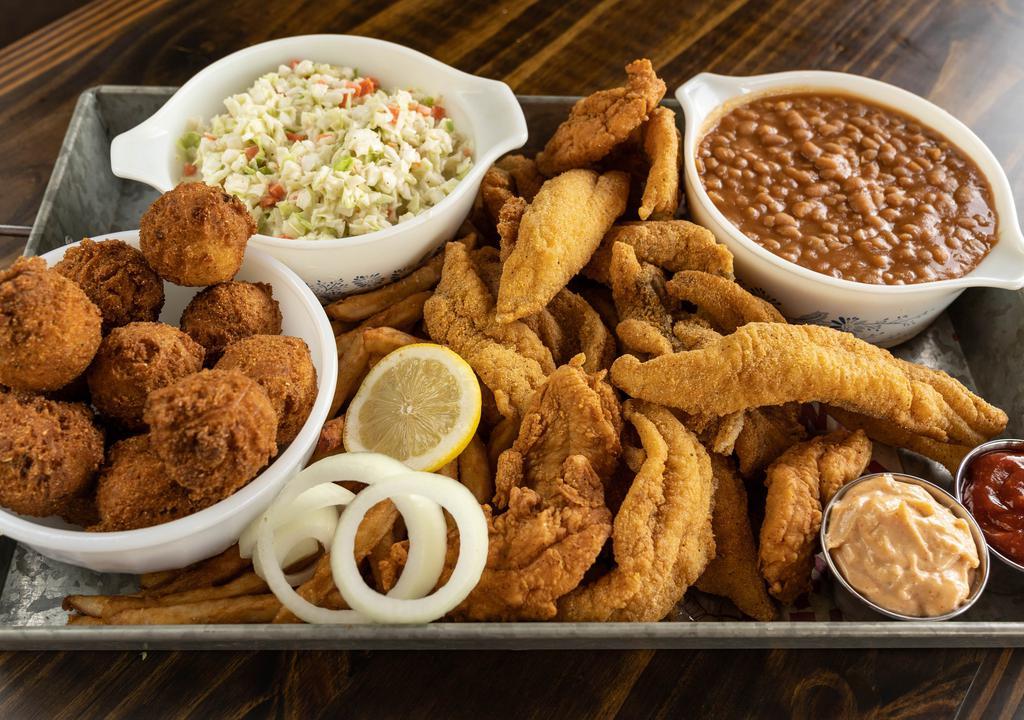 Ultimate Family Pack · Ten pieces U.S. farm-raised catfish, four fresh, free-range Arkansas chicken tenders, served with three large regular sides and ten hush-puppies. Serves four to five.