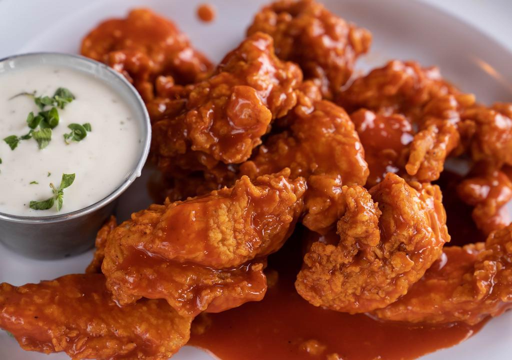 Boneless Chicken Wings · Fresh, free-range Arkansas  boneless chicken wings hand-breaded, fried, and tossed in your choice of buffalo, honey BBQ, or mixed sauce. Served with one regular side.