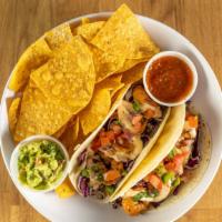 2 Baja Shrimp Tacos · Grilled shrimp topped with red cabbage, pico and Baja sauce. 
Choice of tortilla, served wit...