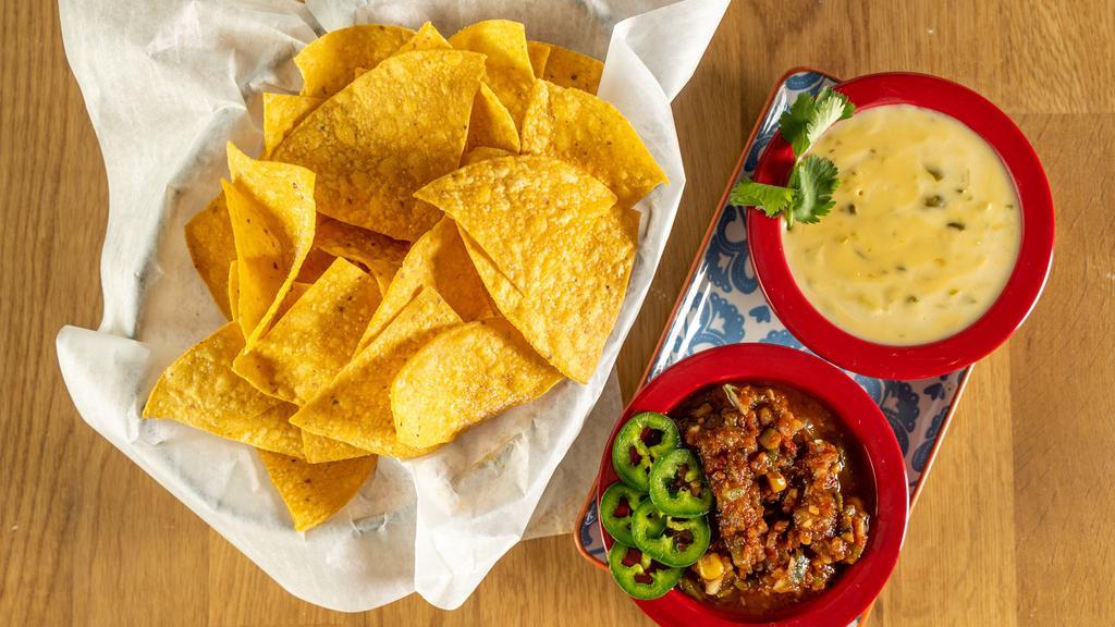 Dip Duo · Chips served with choice of 2: salsa, guacamole or blanco queso.