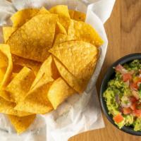 Guacamole And Chips · House made fresh guacamole served with house chips.