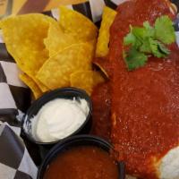 Smothered Burrito · Choice of shredded chicken, al pastor, ground beef or our vegan no moo option stuffed with c...