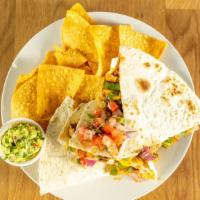 Grilled Steak, Chicken Or Shrimp Quesadilla · Sirloin steak, stuffed with cheese, peppers, onions and mushrooms. With chips and salsa.