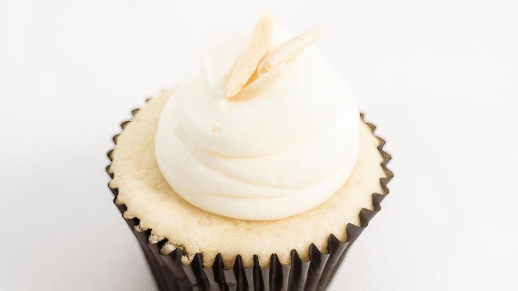 Butter Almond · Almond flavored Butter cake with almond buttercream icing topped with slivered almonds