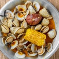 1/2 Lb Clams · Served with corn and potato.