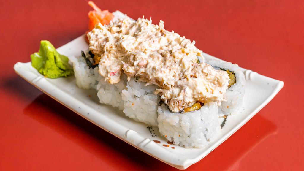Tsunami Roll · Tempura shrimp, spicy mayo and topped with snow crab.