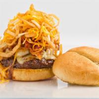 Old Tyme A1 Burger · Our world famous burger with cheddar, swiss, and jack cheeses, topped with sizzling bacon, s...