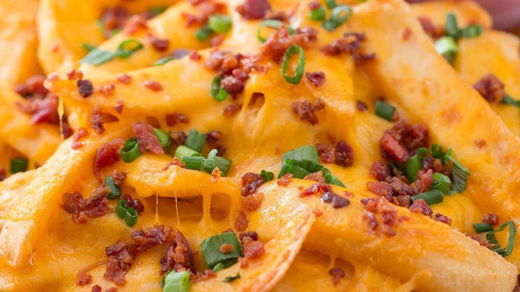 Cheese Fries · With bacon and scallions.