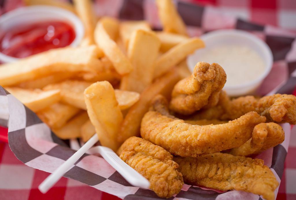 Catfish Basket · Farm raised and deep fried, golden brown catfish strips served with your choice of side and tartar sauce.