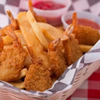 Shrimp Basket · Breaded shrimp, deep fried to a golden brown, served with your choice of side and a side of ...