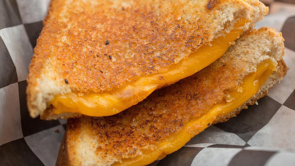 Kid'S Grilled Cheese · Includes beverage.
