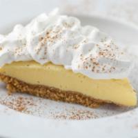 Homemade Lemon Ice Box Pie · Topped with whipped cream.