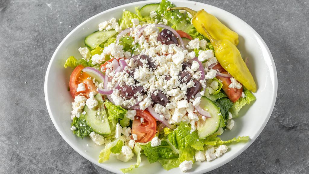 Greek Salad · Organic Romaine Lettuce, Tomato, Cucumber, Onions, Olives, Pepperoncini and Feta Cheese with Homemade Greek Dressing