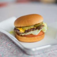 Cheeseburger · Custom beef patty ground in-house daily served with American cheese, pickle, lettuce, onion,...
