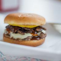 Shroom & Swiss Burger · Custom beef patty ground in-house daily served with swiss cheese, smoked mushrooms, mustard,...