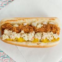 Slaw Dog · A Hot dog served with coleslaw, chopped onions, mustard, and chili sauce.