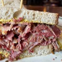 Sarge · House smoked pastrami piled high, Gulden's deli mustard, served on fresh baked sourdough rye...