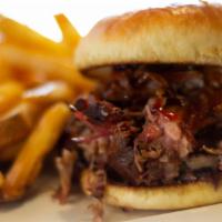 Big Bbq Sandwich · Tender, juicy Brookwood Farms pulled pork BBQ piled high and drizzled with Kentucky Bourbon ...