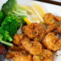 Calabash Jumbo Shrimp Platter · Ten jumbos, perfectly fried, tail-on shrimp served with Vidalia Onion coleslaw, fries, and c...