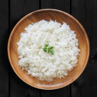 (Vegan) Plain Basmathi Rice · Our long grain aromatic basmati rice, steamed to perfection.