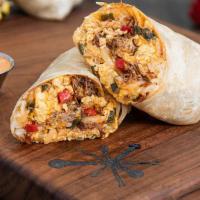 Barbacoa Breakfast Burrito · Flour tortilla filled with slow-cooked barbacoa, cage-free scrambled eggs, cheddar & jack ch...