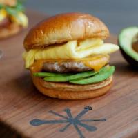 Sausage, Egg & Cheese Sammie · Griddled brioche bun spread with our house-made sriracha aioli, caramelized onions, sliced a...