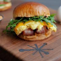 Bacon, Egg & Cheese Sammie · Griddled brioche bun spread with our house-made chipotle aioli, Snooze signature bacon, cage...