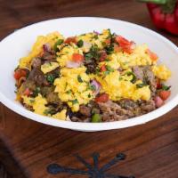 Bodegga Signature Breakfast Bowl · A heaping portion of hash browns, sauteed red bell peppers, poblanos & onions, black beans, ...