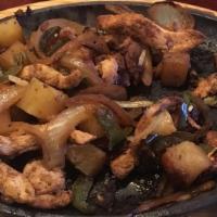 Lunch Chicken Pineapple Fajitas · Grilled chicken fajita served with onion and bell peppers. Smothered with shredded cheese an...