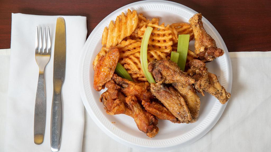 Wings Combo (10 Pcs.) · Served with fries and 12  FL OZ  can drink.