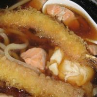 Nabeyaki Seafood Udon · Udon noodle soup with seafood.