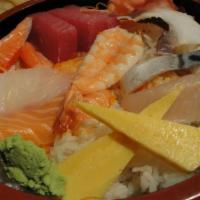 Chirashi Sushi Lunch · Assortment of raw fish on a bed of sushi rice. 
Served with Miso Soup & House Salad.