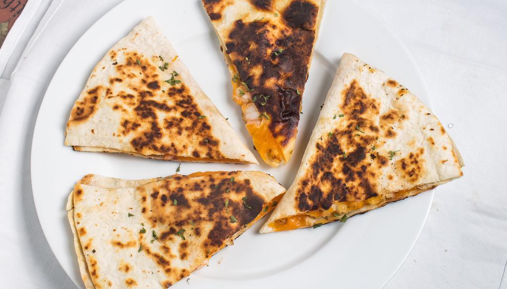 Shrimp Quesadilla · Fresh louisians shrimp, swiss and cheddar cheese, onioon, and bacon. Served with sour cream and salsa.