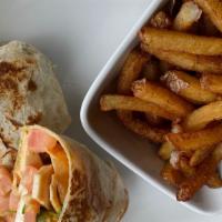 Chicken Wrap · Fried or grilled chicken, mixed greens, tomatoes, and onion. Served with a side of ranch.