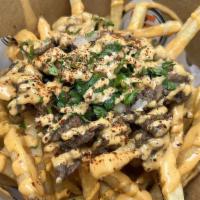 Bulgogi Fries · French fries and beef bulgogi topped with cilantro, onions, and spicy aioli.
