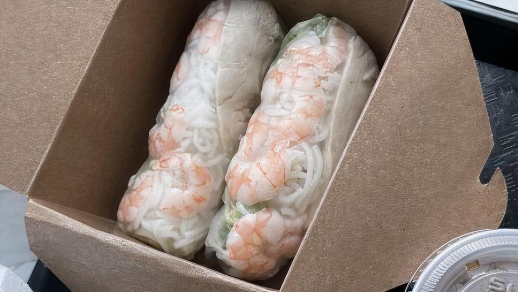 Spring Rolls (2 Pieces) · Vermicelli, lettuce, herbs, and choice of peanut sauce or nuoc mam (fish sauce).