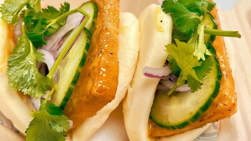 Spicy Citrus Tofu Bao (2 Pieces) · Spicy. Cucumbers, red onions, and cilantro.