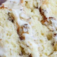 Italian Creme Cake · Our dense buttermilk cream cake with coconut and pecans is covered in our Homemade Cream Che...