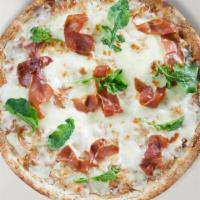 Prosciutto Italiano Pizza · An olive oil glaze with fresh garlic, topped with a bed of mozzarella cheese, sun-dried toma...