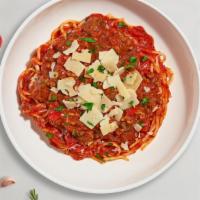 Bolognese Pasta · Ground beef cooked in classic flavorful marinara sauce and your choice of pasta. Served with...