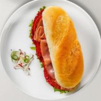 Italian Sub · Hot or cold. Genoa salami, Italian pepperoni, ham with red onion, banana peppers, provolone ...