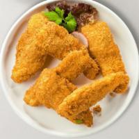 Chicken Tenders · Four to six breaded and baked chicken tenders served with your choice of BBQ or Buffalo sauce.