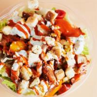 Buffalo Chicken Salad · organic romaine, grilled chicken, pickled celery, cherry tomatoes, croutons, bleu cheese cru...