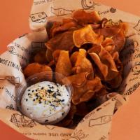 Sweet Potato Chips And Dip · Local sweet potato chips, herbes de provence salt with a choice of dip