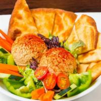 Hummus Platter · With assorted veggies and flat-bread.
