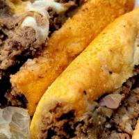 Philly Cheesesteak · A classic Philly. No bell peppers just onions and high-quality thin sliced beef. Comes with ...